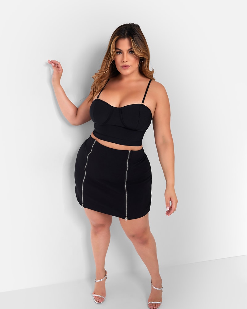 Front of a model wearing a size 4X Dani Bandage Corset Crop Top in Black by Rebdolls. | dia_product_style_image_id:325352